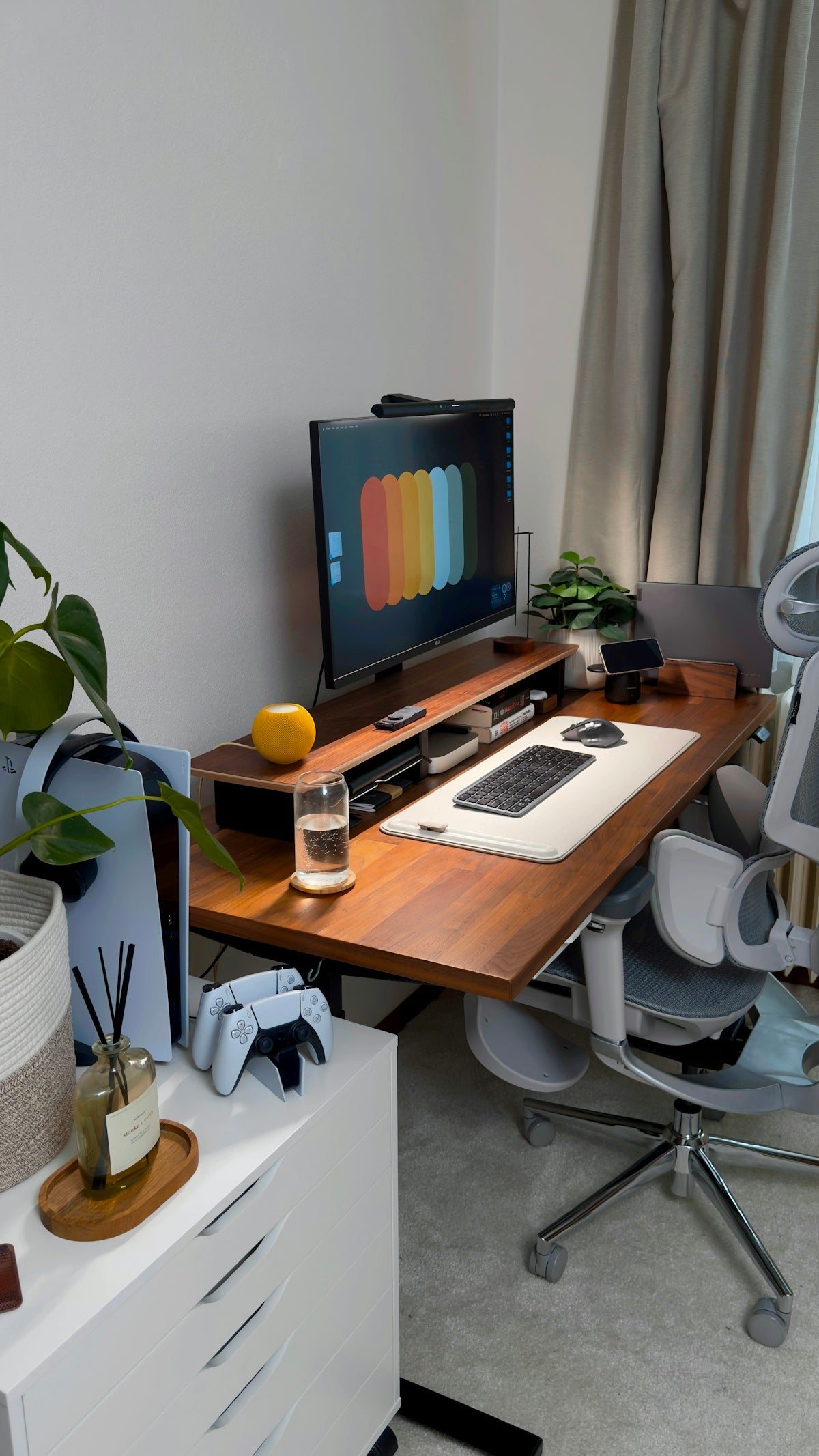 A modern desk setup with computer and gaming accessories